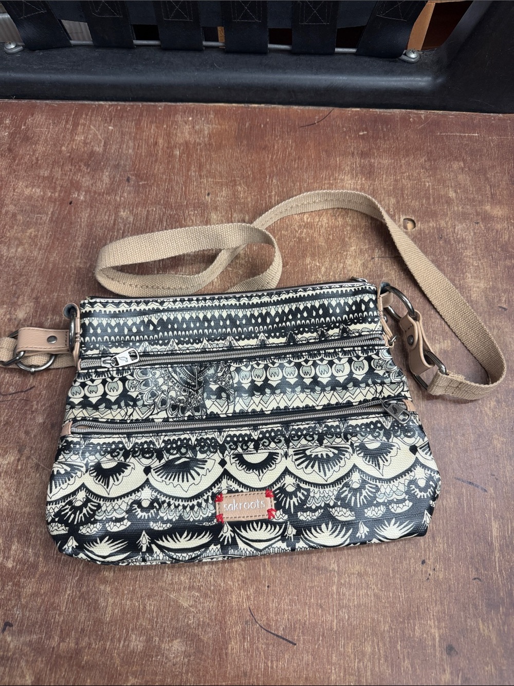 Sakroots Black & Cream Patterned Crossbody Bag with Tan Strap